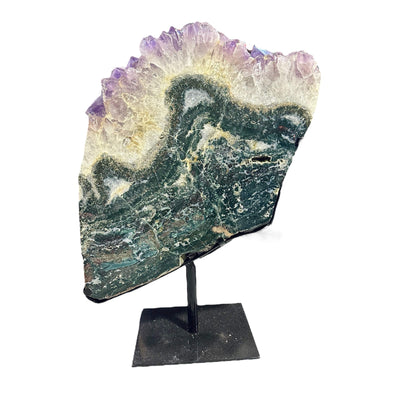 amethyst with jasper on metal stand on white background