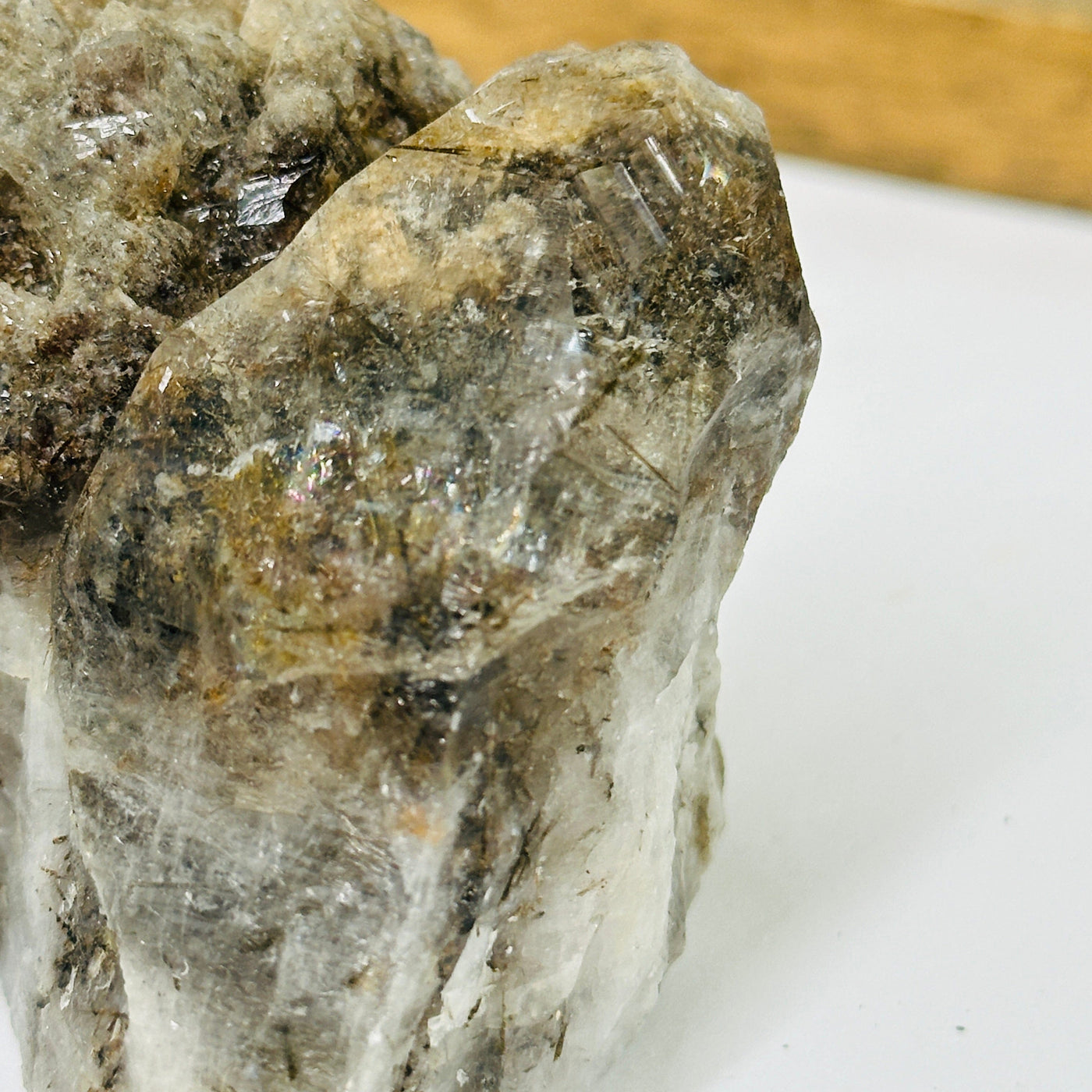 rutile quartz with decorations in the background