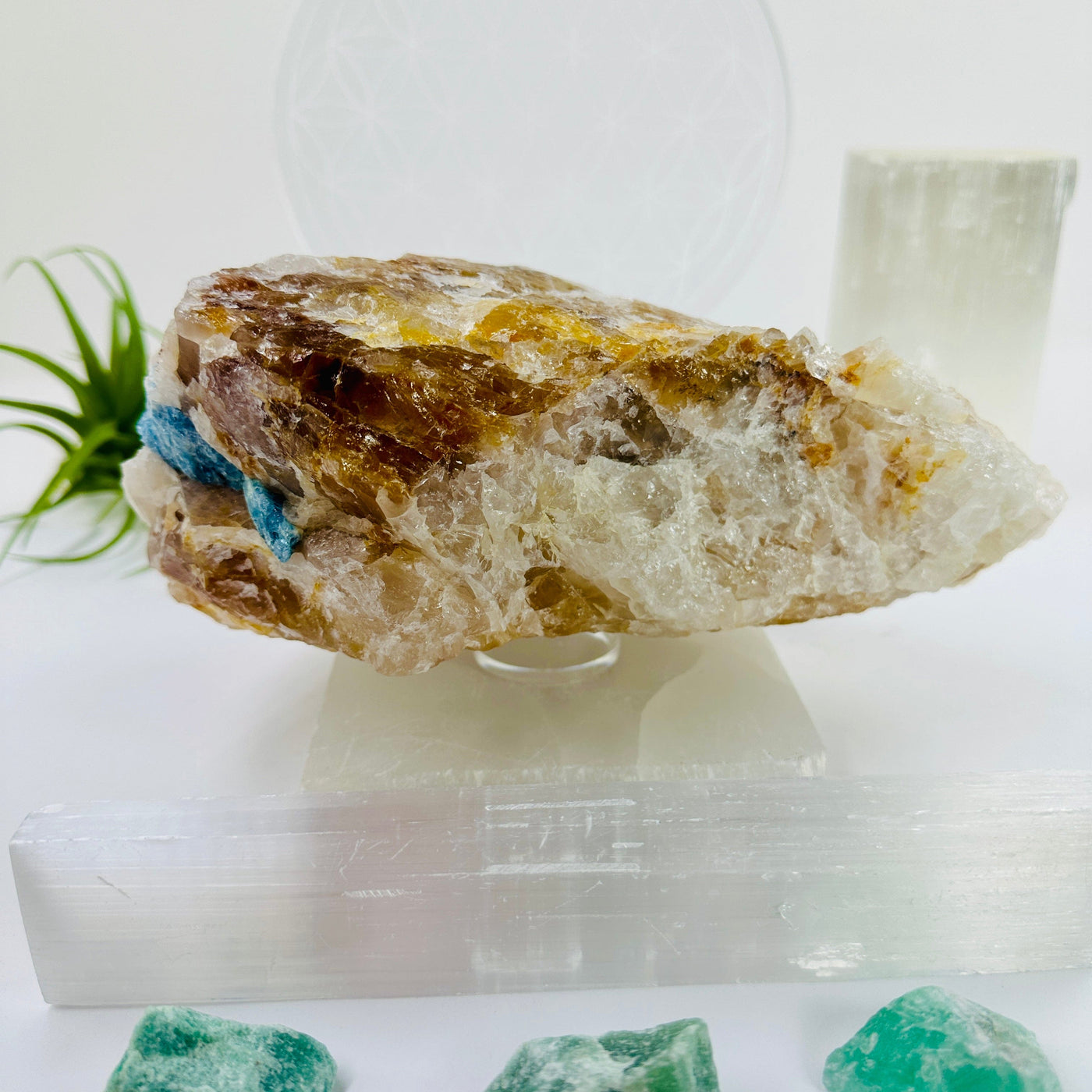 Aquamarine in matrix - aquamarine crystal embedded in large natural rough stone side view