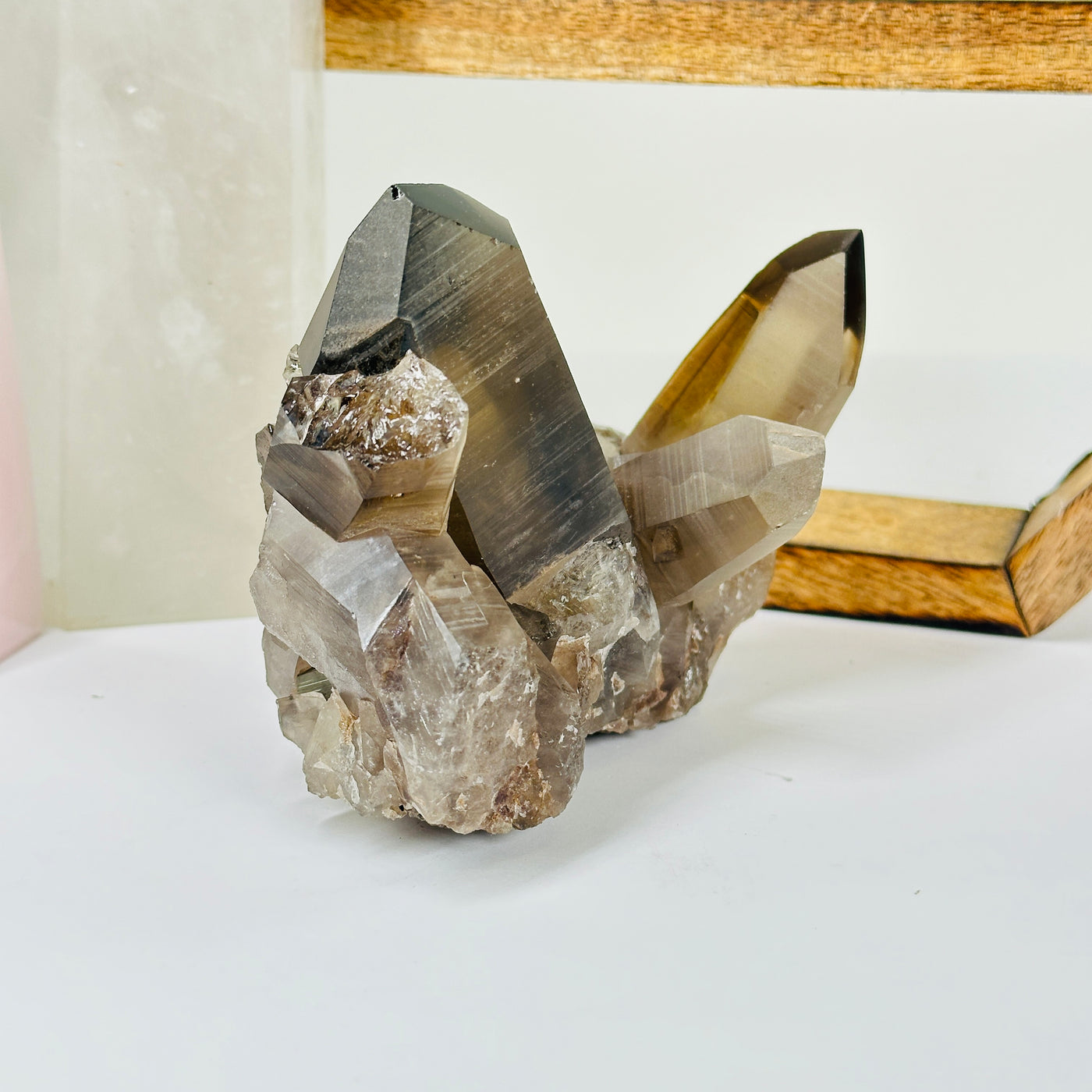 smokey quartz with decorations in  the background