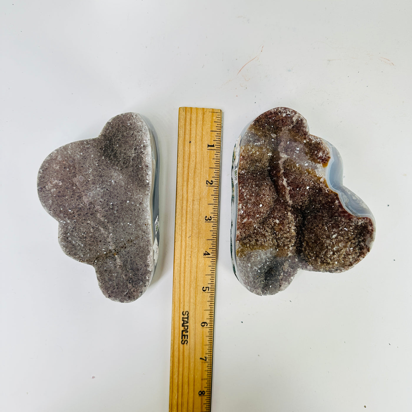 agate cloud next to a ruler for size reference