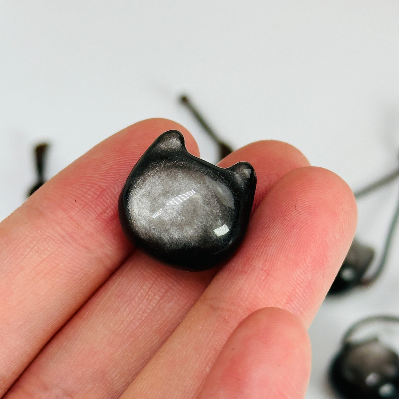 obsidian beads on white background