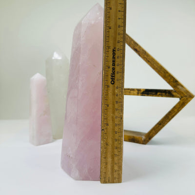 rose quartz tower with decorations in the background