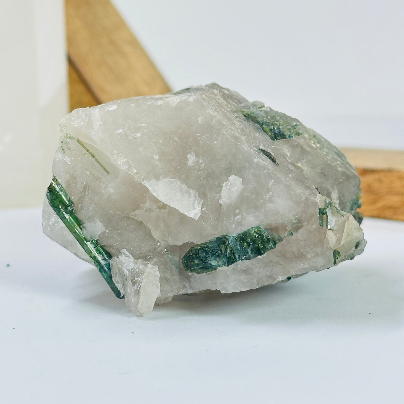 tourmaline with decorations in the background