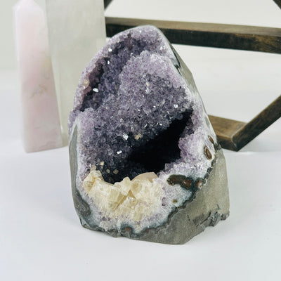 amethyst cut base with decorations in the background
