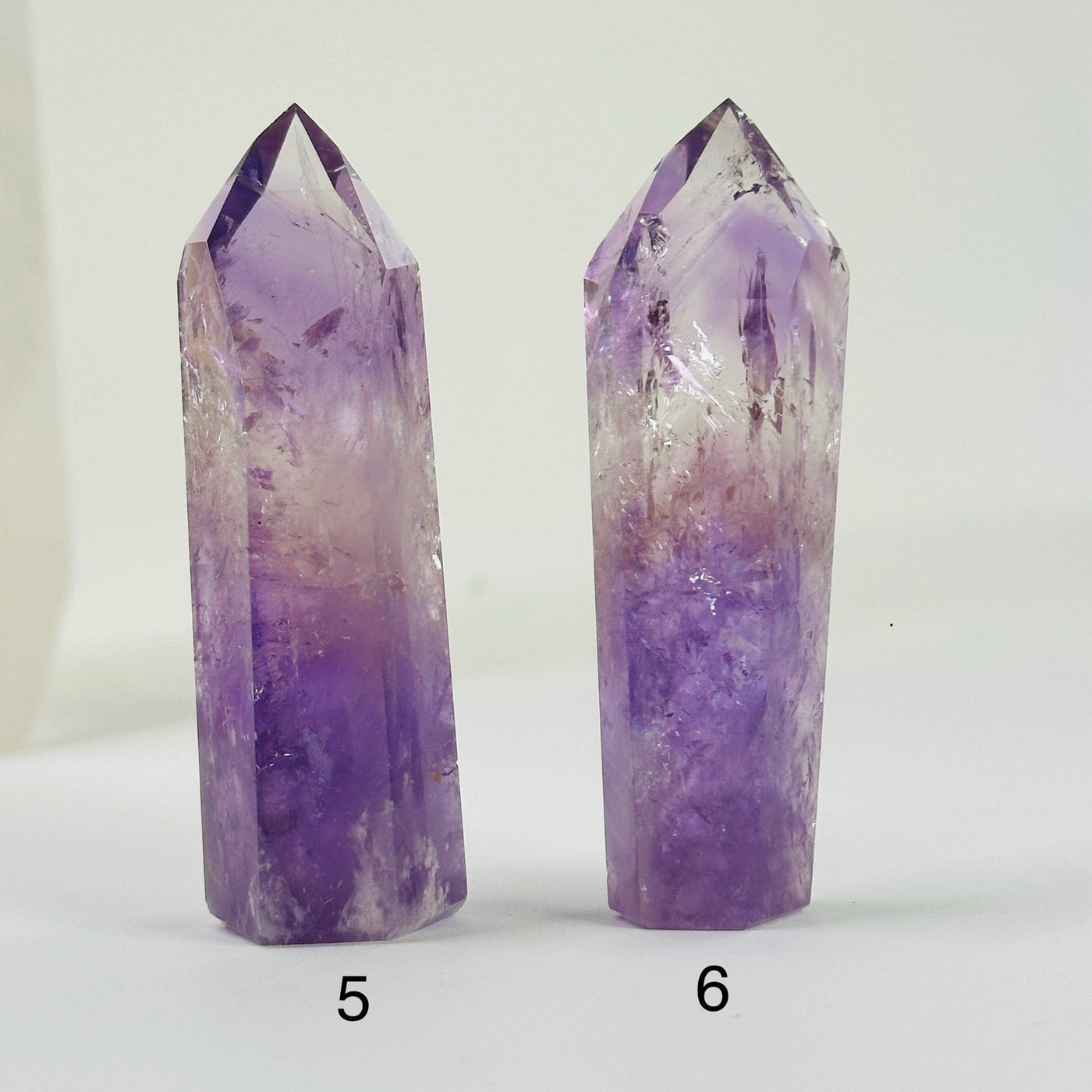 amethyst points with decorations in the background