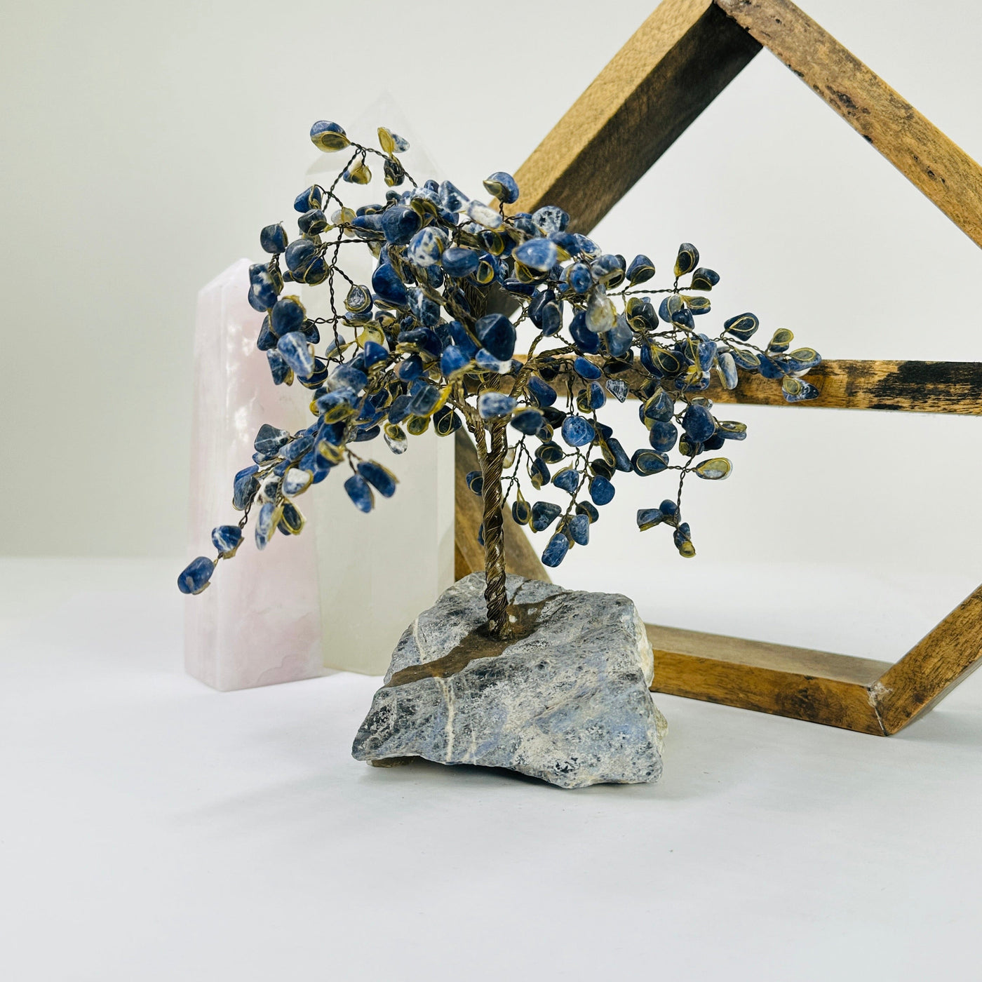 sodalite tree with decorations in the background