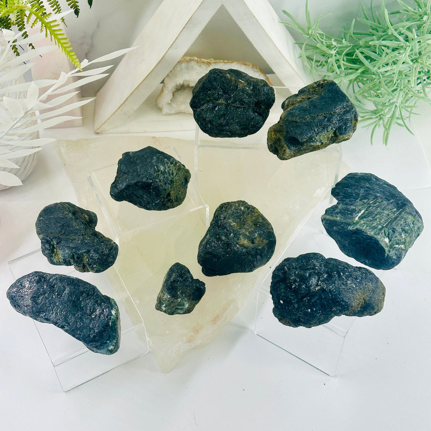 Green Tourmaline - Rough Stone - You Choose all variants arranged on acrylic stands and quartz platter with props in background