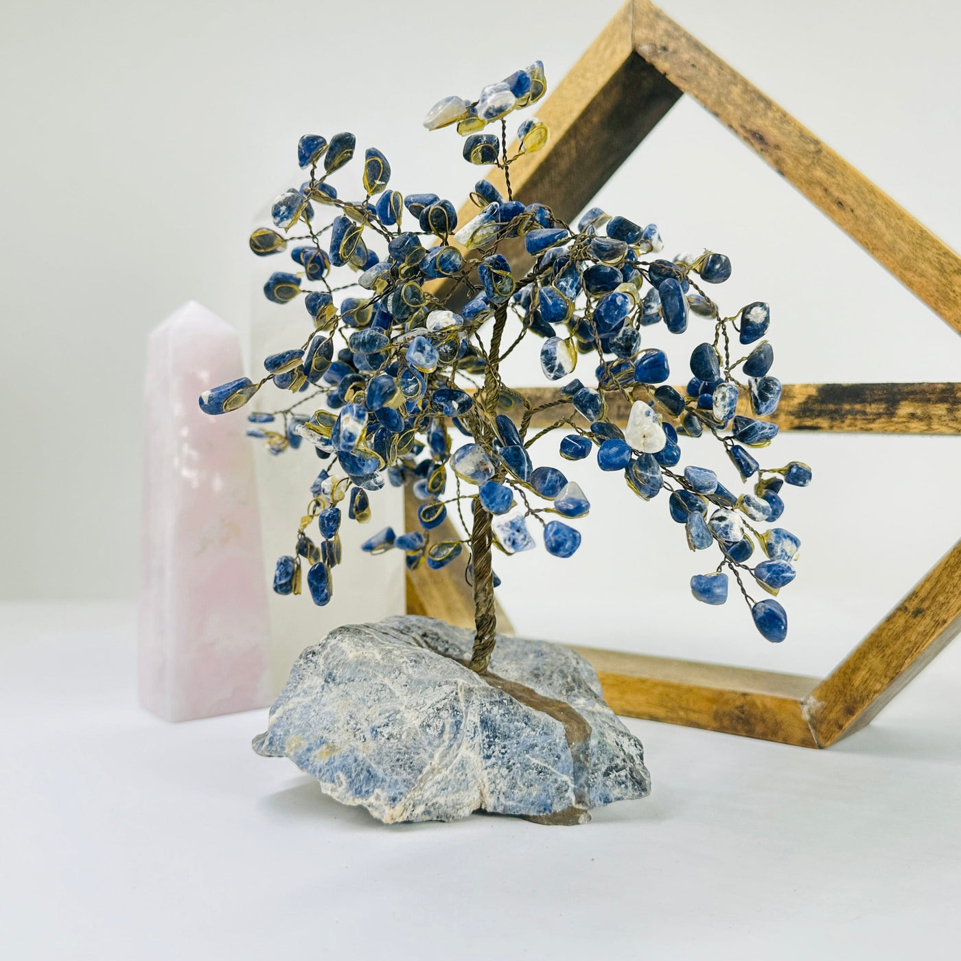 sodalite tree with decorations in the background