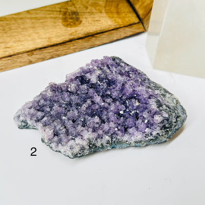 amethyst with decorations in the background