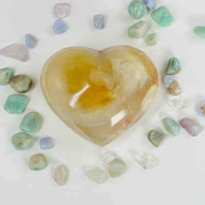 carnelian heart surrounded by other crystals