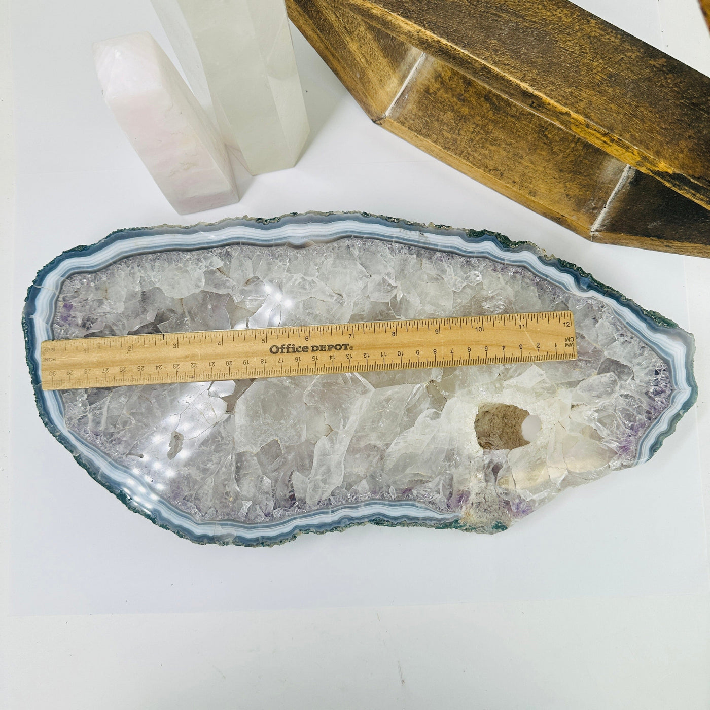 amethyst platter next to a ruler for size reference