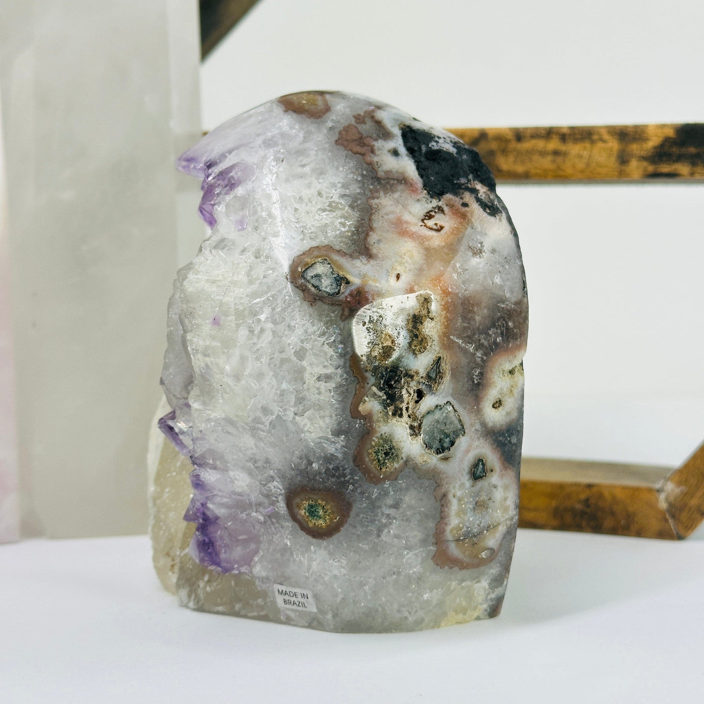 amethyst cut base with decorations in the background