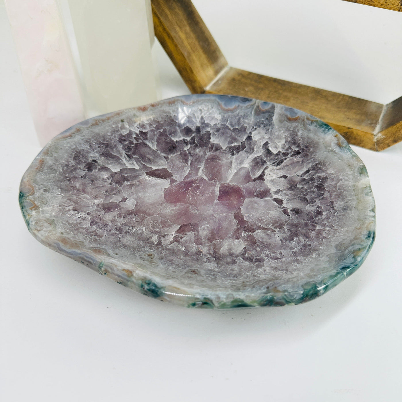 amethyst bowl with decorations in the background