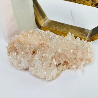 lemurian quartz with decorations in the background