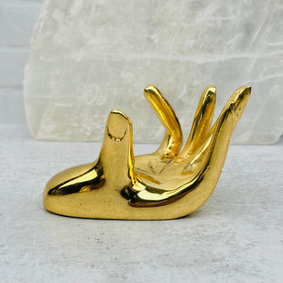 Gold Hand Holder displayed as home decor 