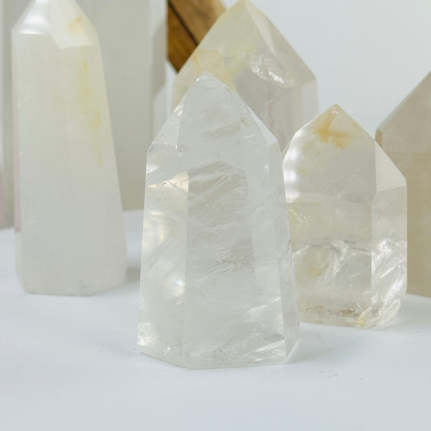 crystal quartz points with decorations in the background
