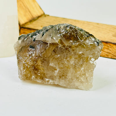 tourmaline with decorations in the background