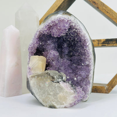 amethyst cut base with decorations in the background