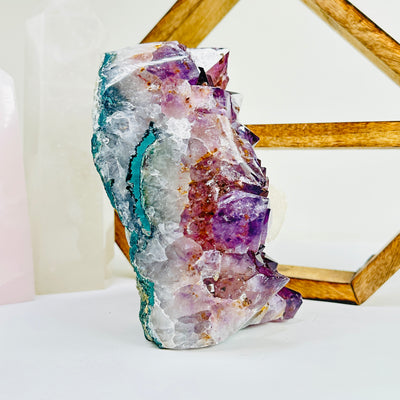 amethyst cut base with decorations in the background