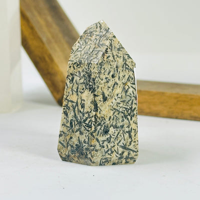 epidote point with decorations in the background