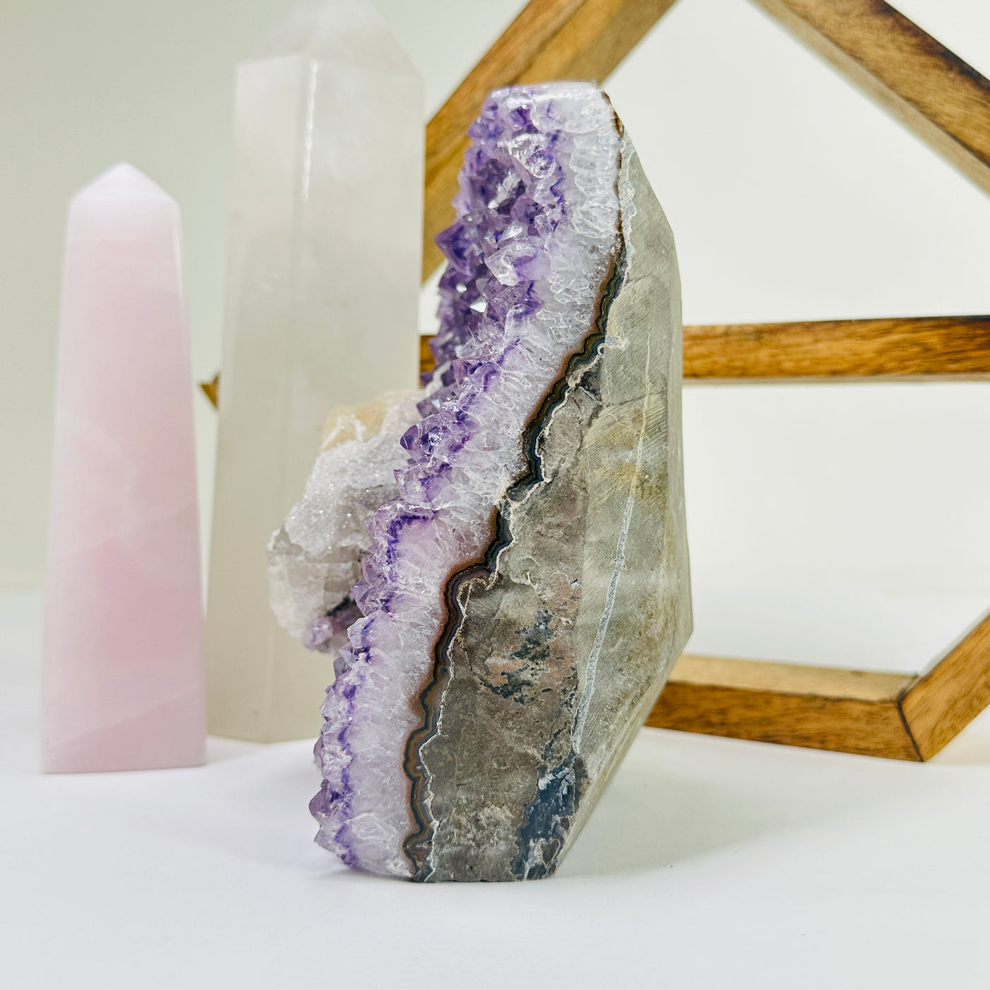 amethyst cut base with decorations in the background