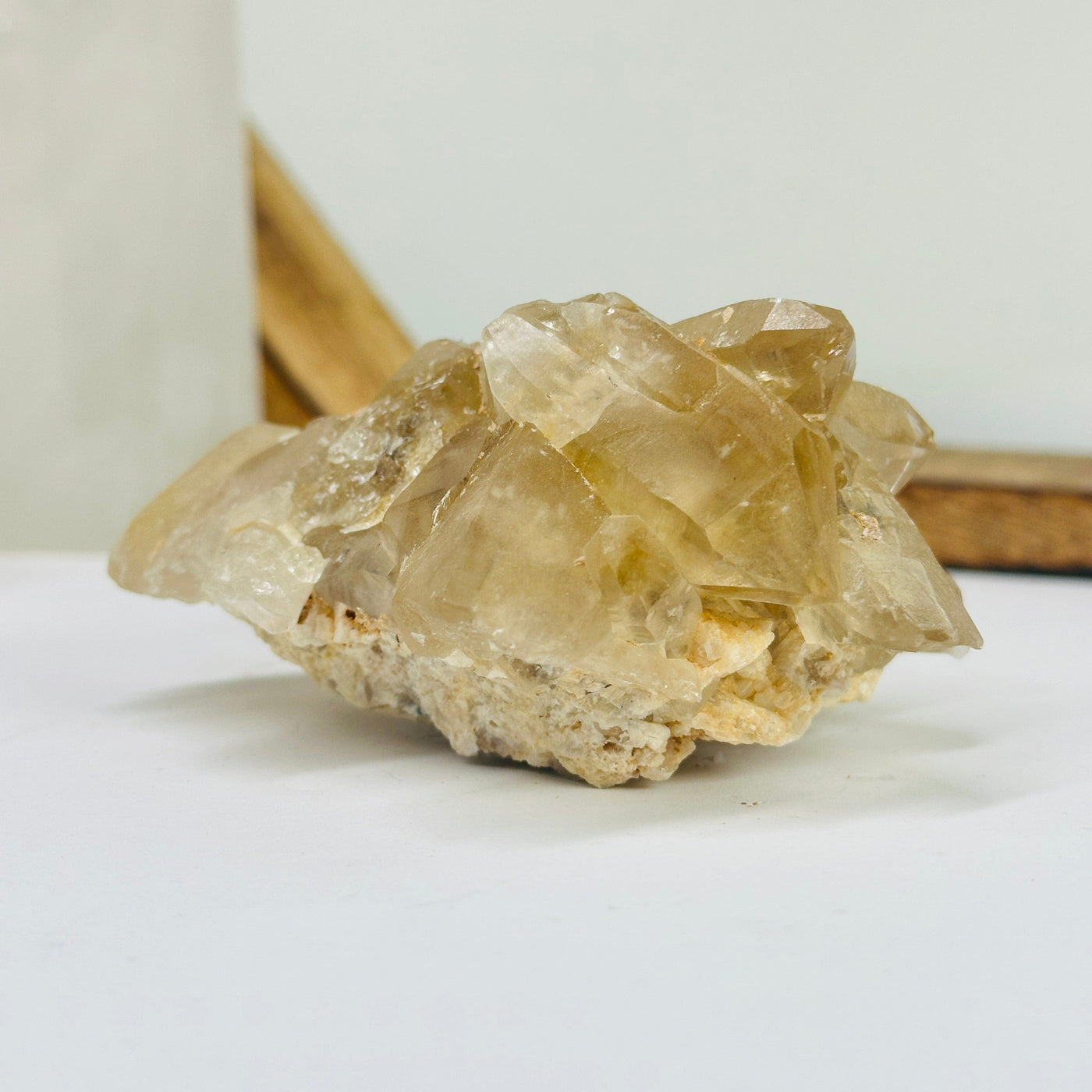 citrine cluster with decorations in the background