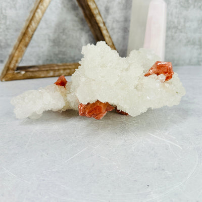 apophyllite with stilbite cluster with decorations in the background