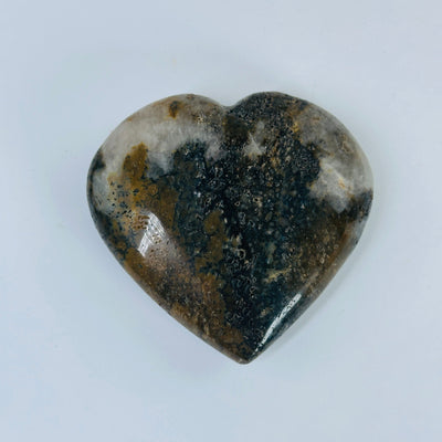 jasper heart with decorations in the background