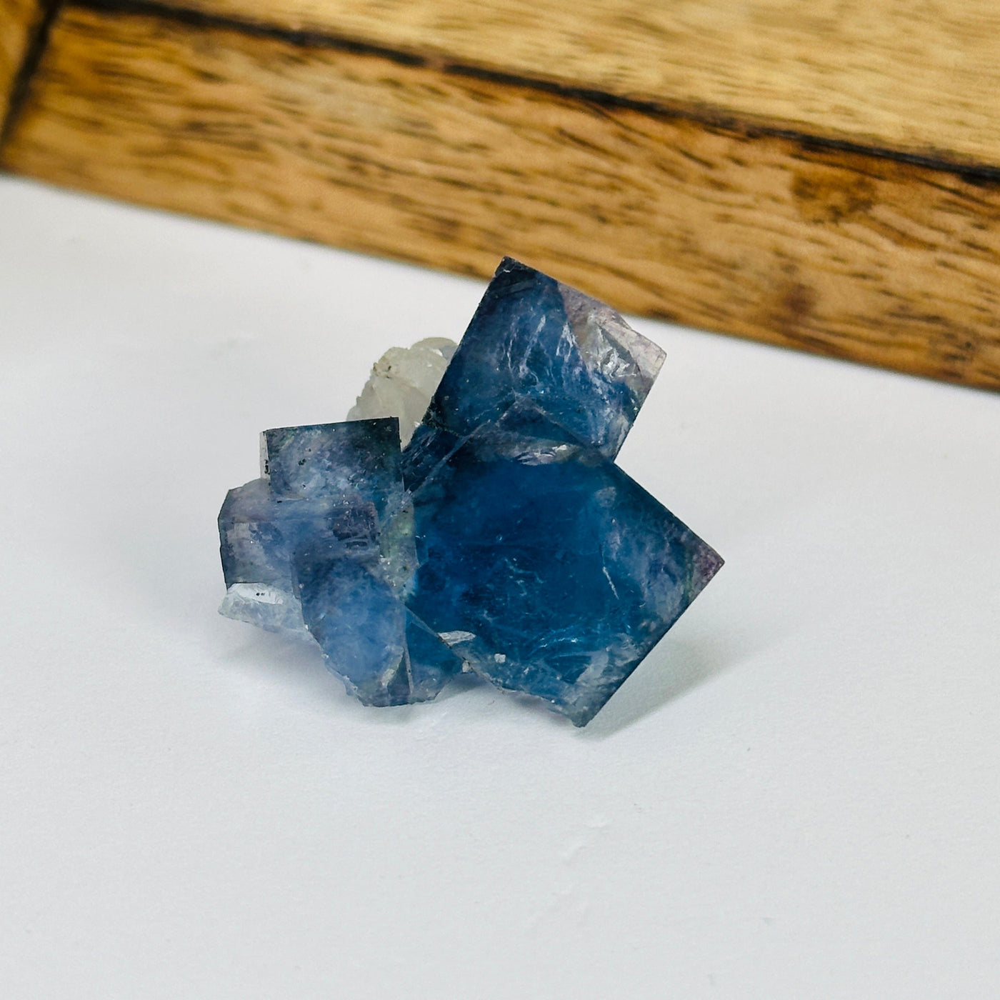 blue fluorite with decorations in the background