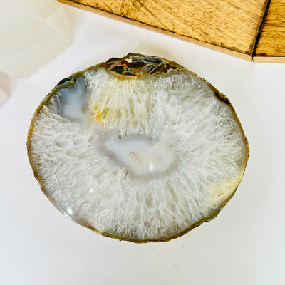 agate platter with decorations in the background