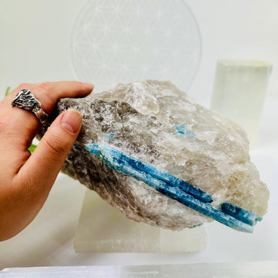  Aquamarine in matrix - aquamarine crystal diagonally embedded in natural rough stone with hand for size reference