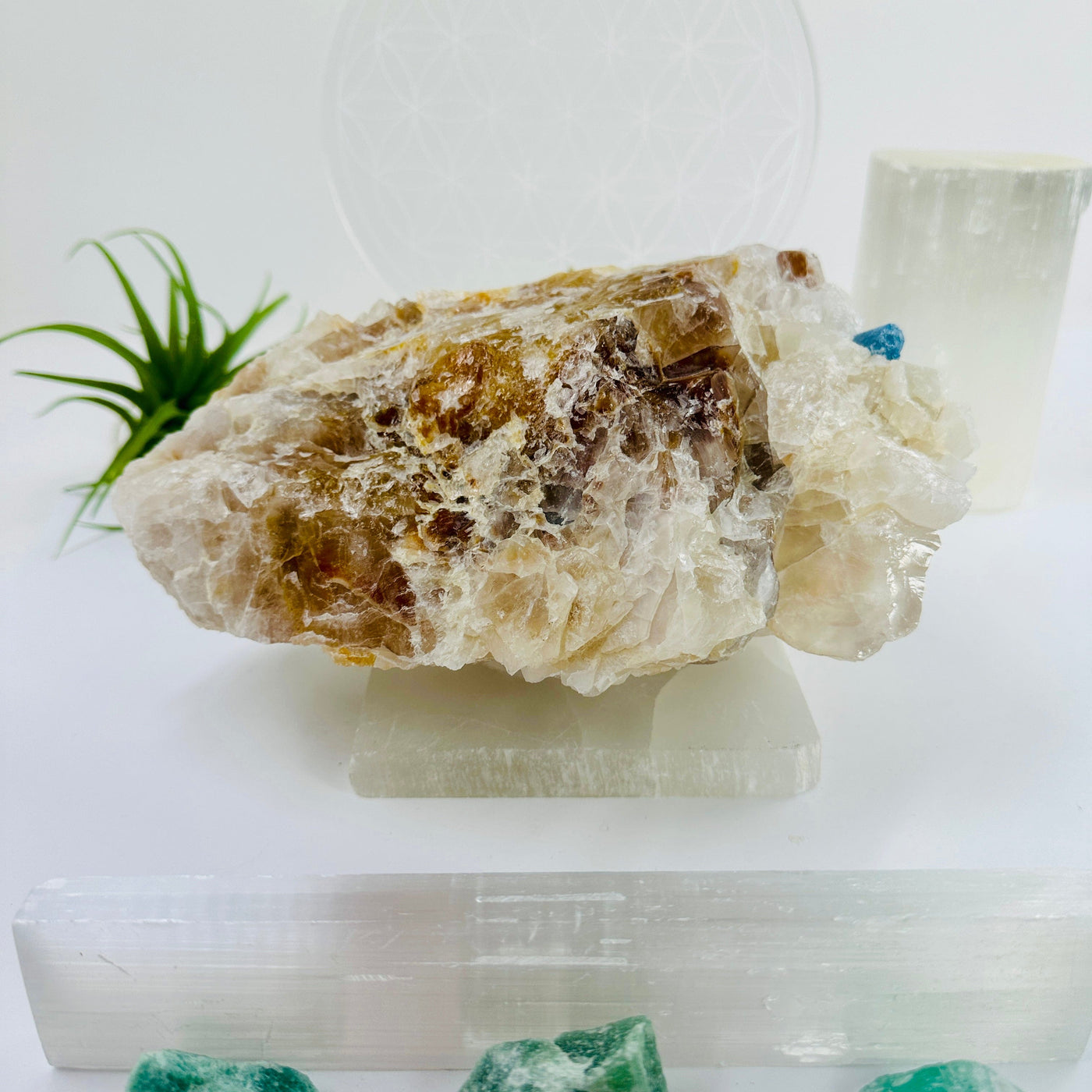Aquamarine in matrix - aquamarine crystal embedded in large natural rough stone side view