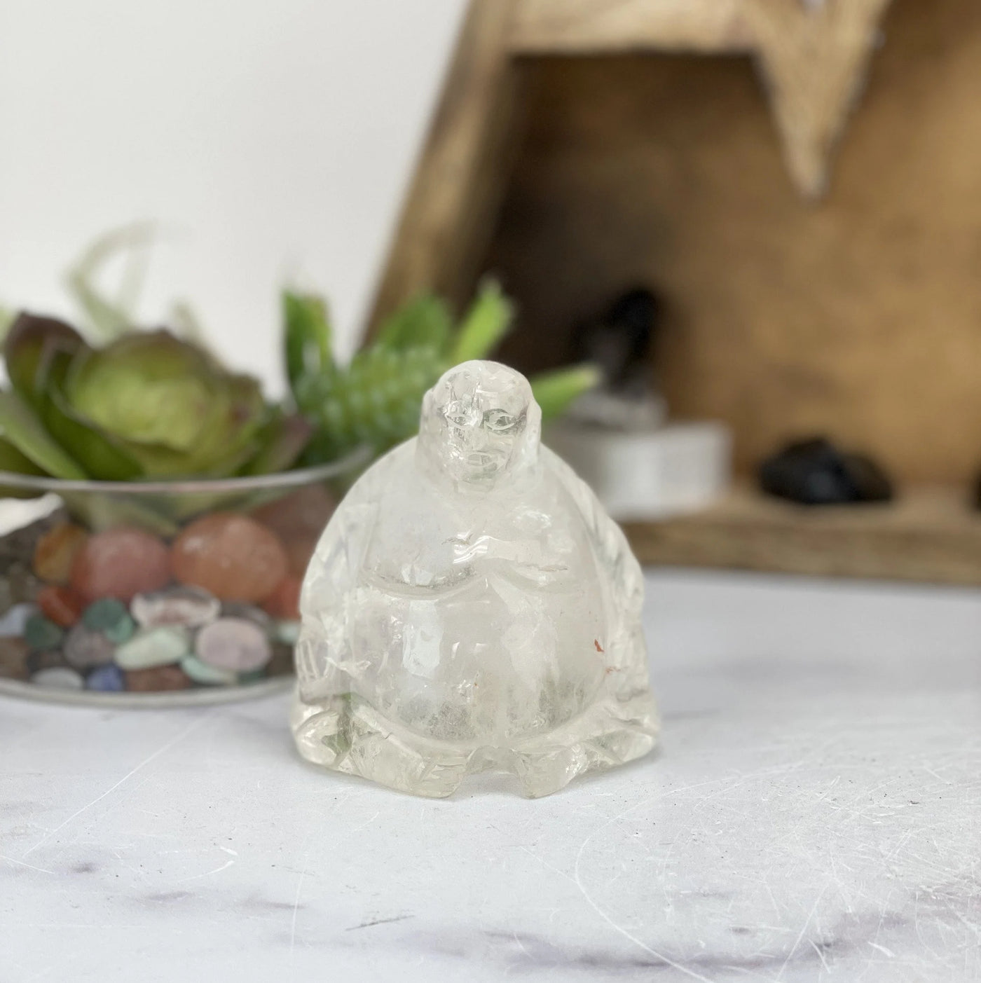 crystal quartz with decorations in the background