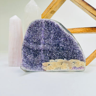 amethyst cut base with decorations in the background