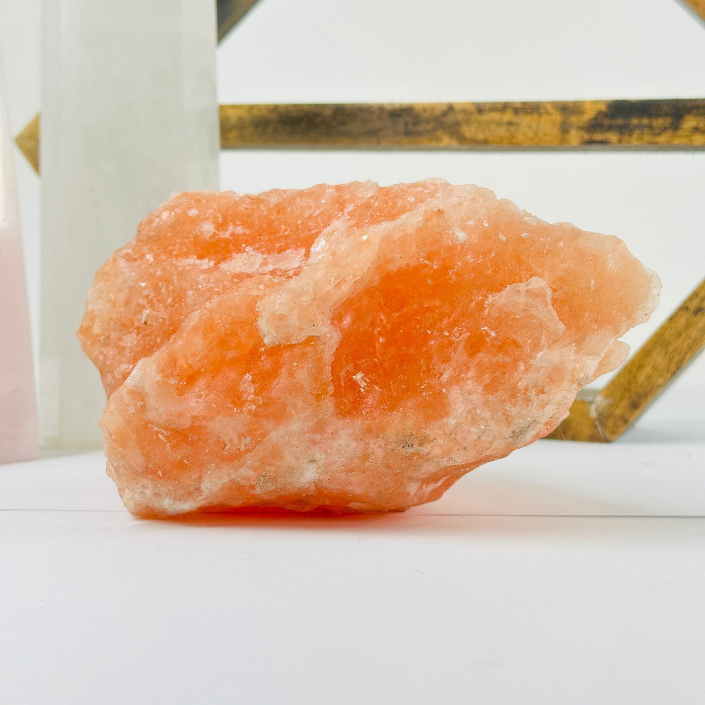 Himalayan salt cluster with decorations in the background