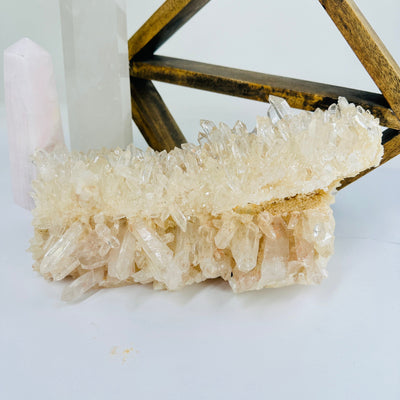 lemurian quartz with decorations in the background