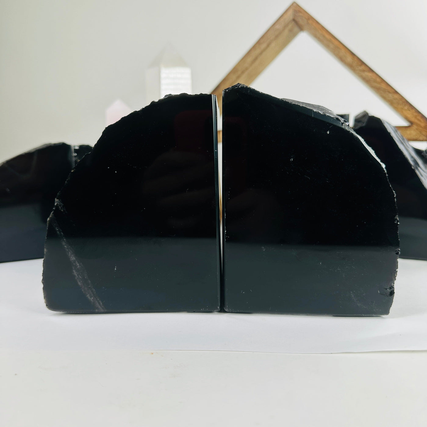 obsidian bookends with decorations in the background