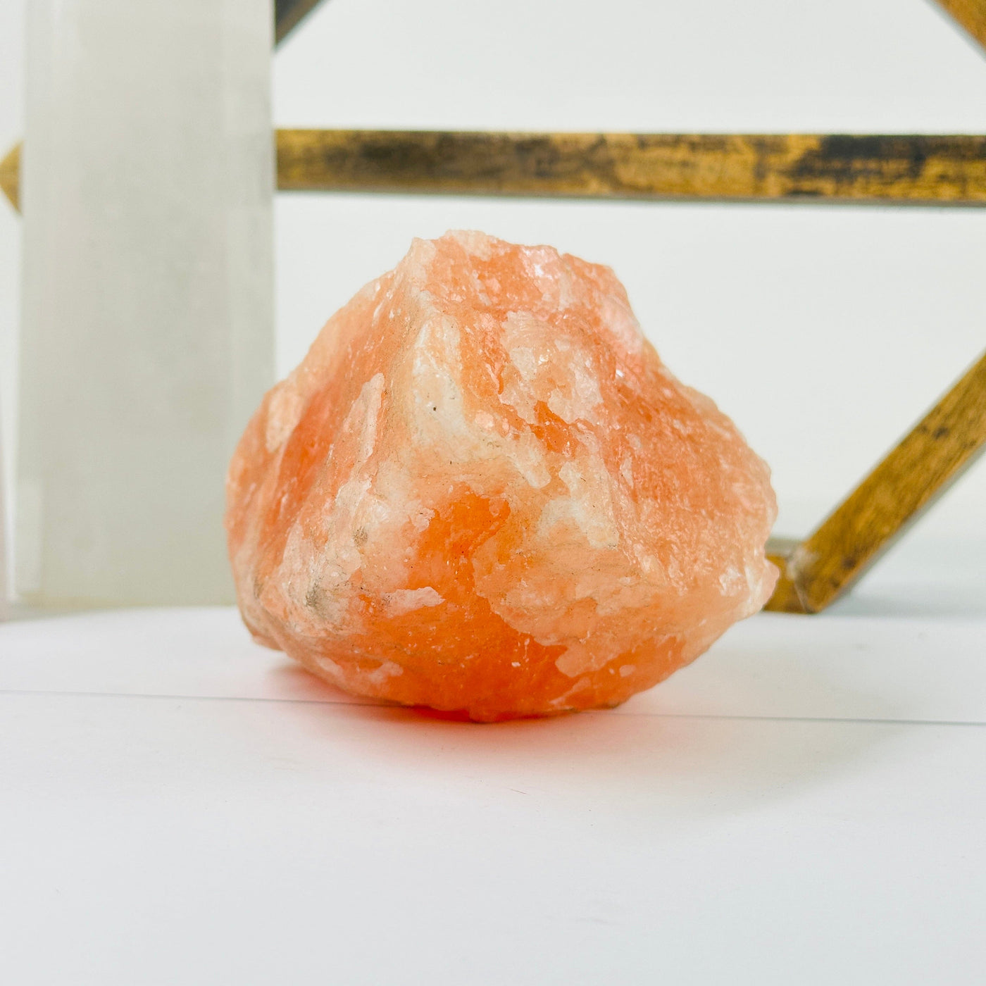 Himalayan salt cluster with decorations in the background