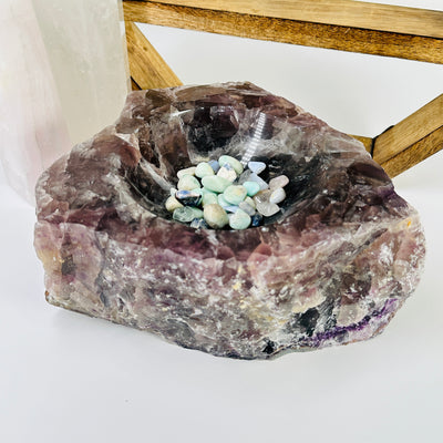 amethyst bowl with decorations in the background