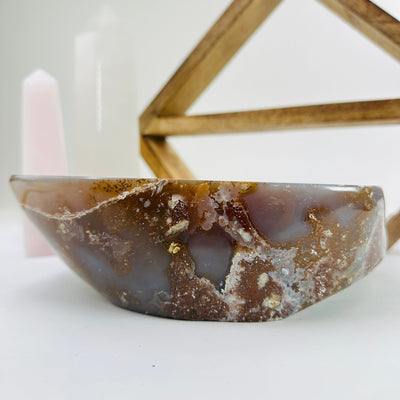 agate bowl with decorations in the background