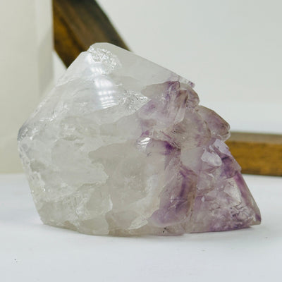 amethyst point with decorations in the background