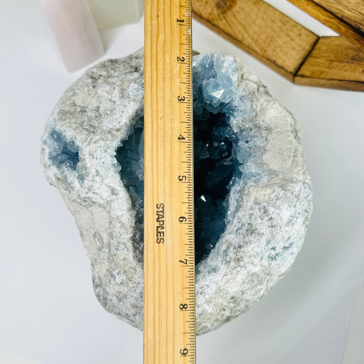 Celestite next to a ruler for size reference