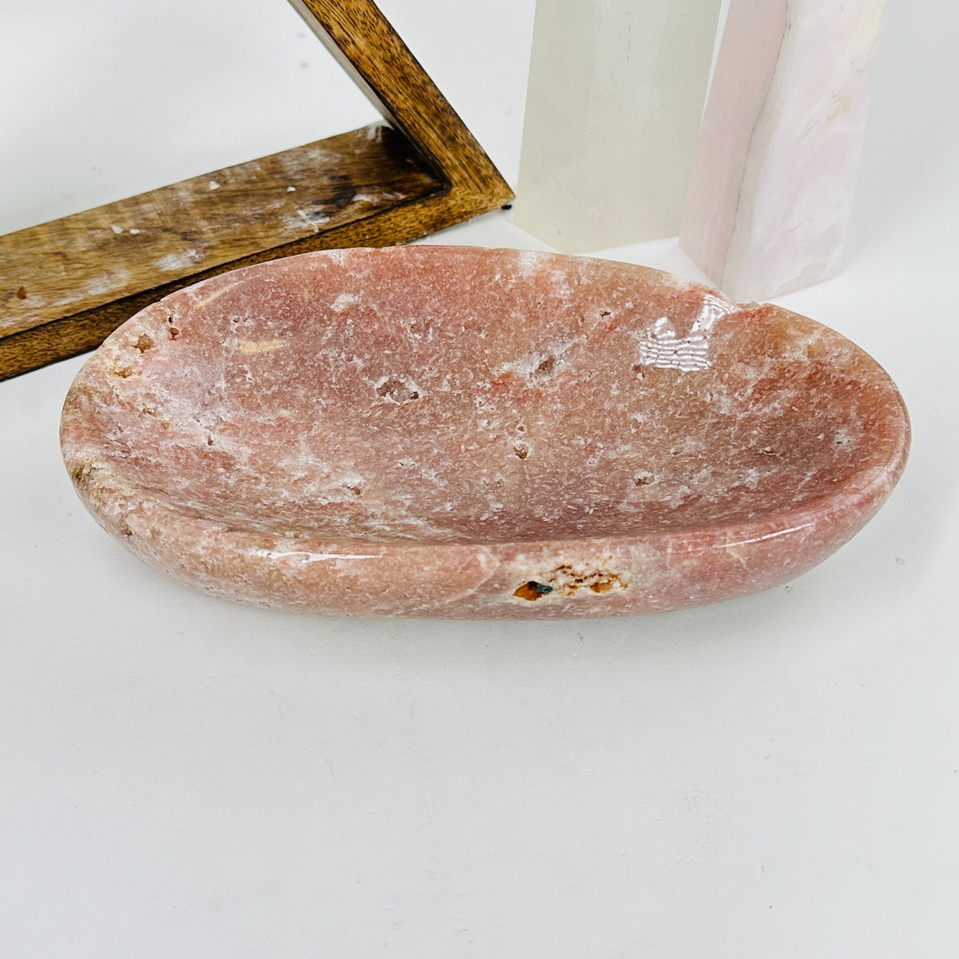 pink amethyst bowl with decorations in the background