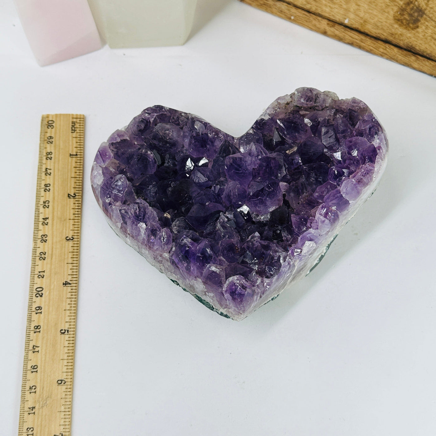 AMTHYST HEARTS WITH DECORATIONS IN THE BACKGROUND