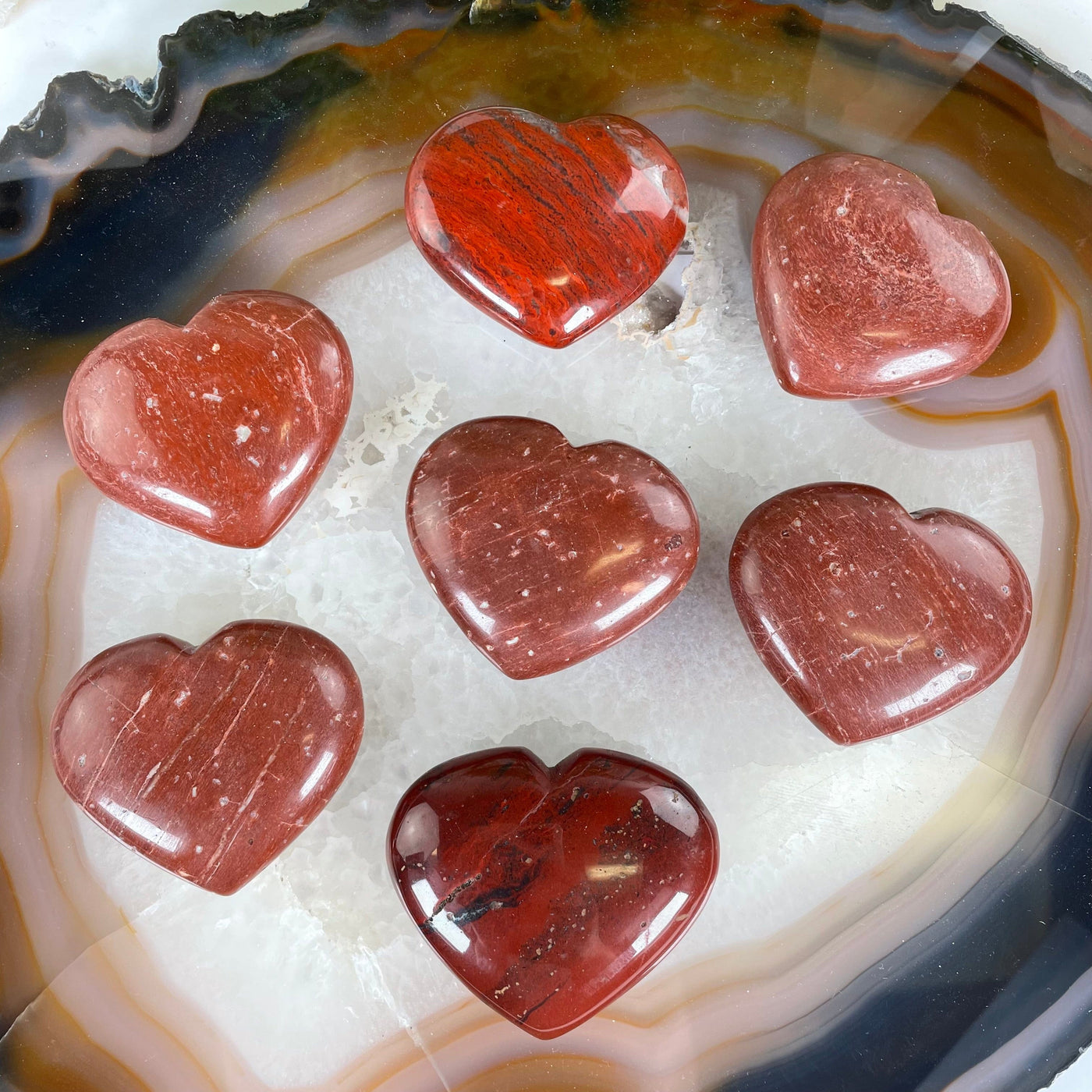 Red Jasper Crystal Heart - You Choose all variants top view on agate slice