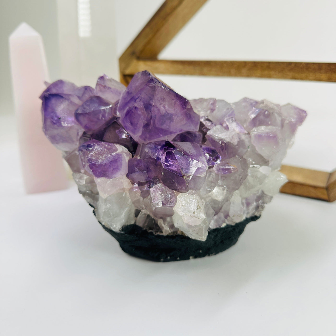 amethyst cut base with decorations in the background