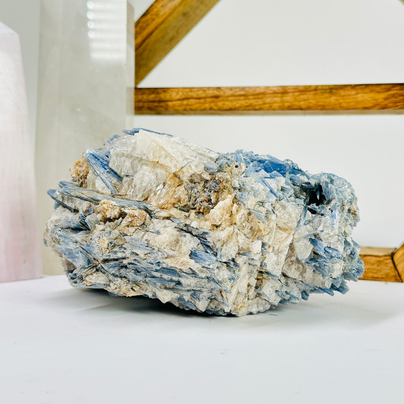 kyanite with decorations in the background