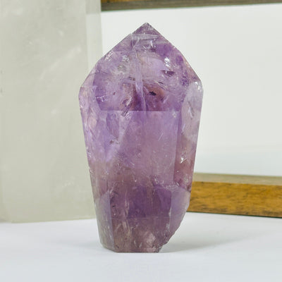 amethyst points with decorations in the background