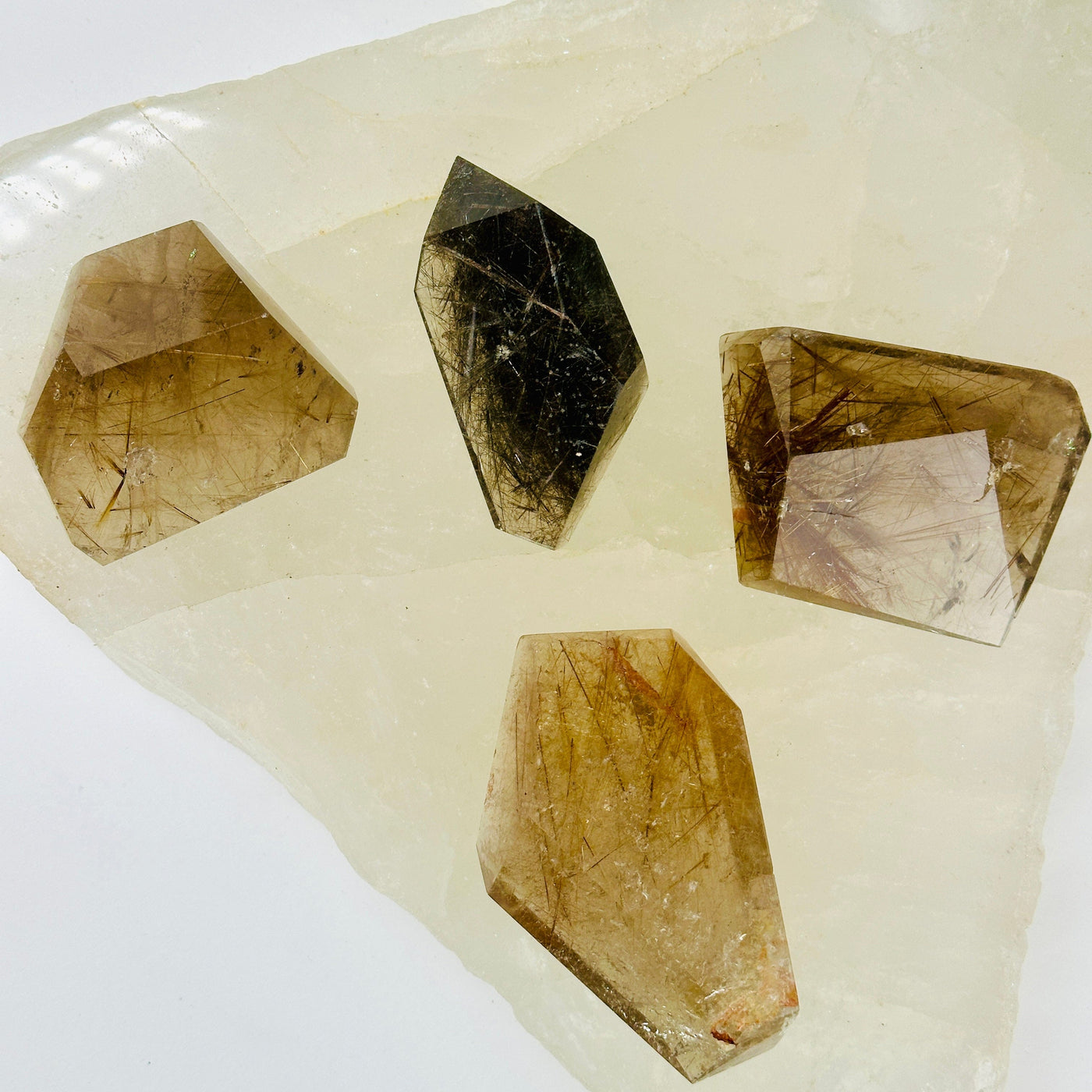 Rutilated Smokey Quartz - Polished Freeform Crystal - You Choose all variants top view on quartz triangular platter